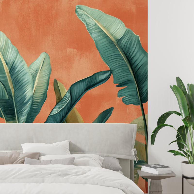 Tropical leaf wallpaper in modern living room with natural light showing banana leaves on terracotta