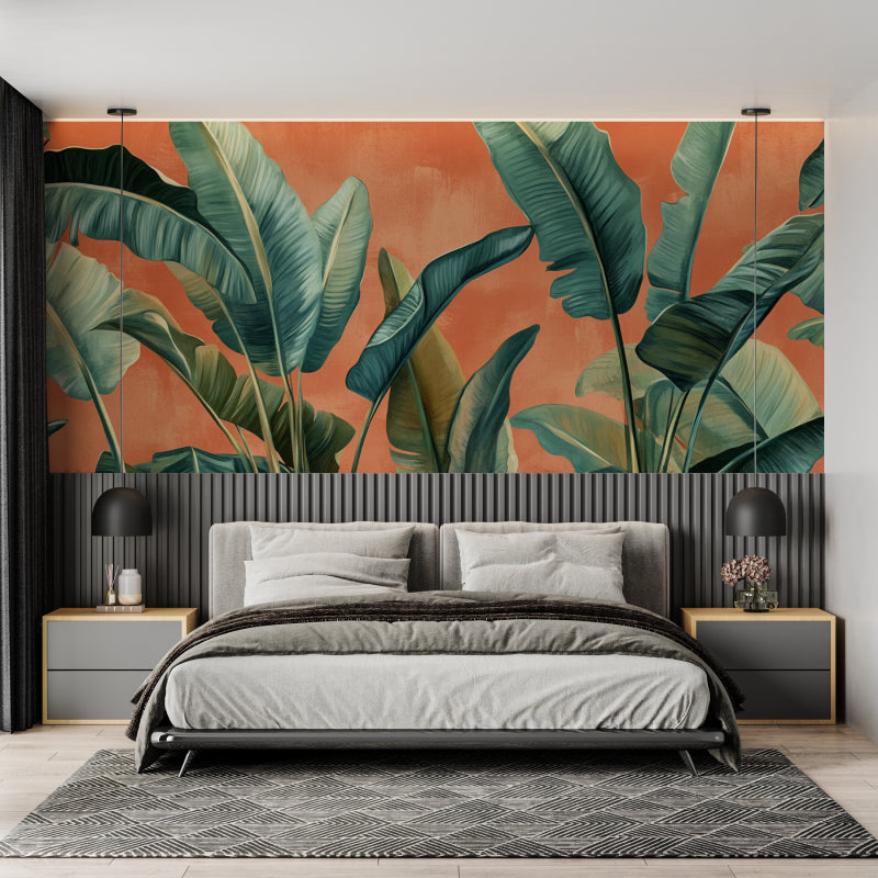 Banana leaf mural creating focal point in dining room with pendant lighting