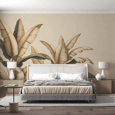 Tropical banana leaf wallpaper in beige tones creating a peaceful atmosphere in a modern living room with natural light
