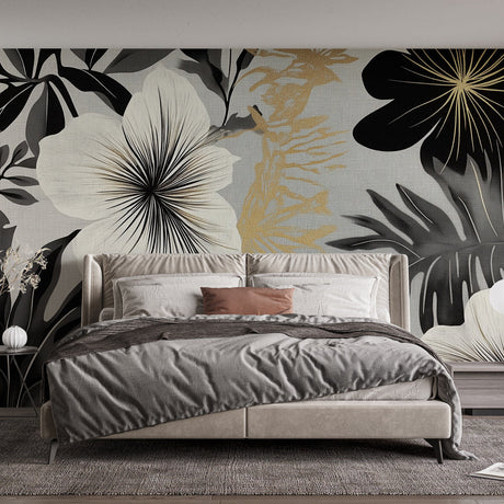 Black and gold tropical wallpaper mural creating a stunning backdrop in a modern dining room with ambient lighting