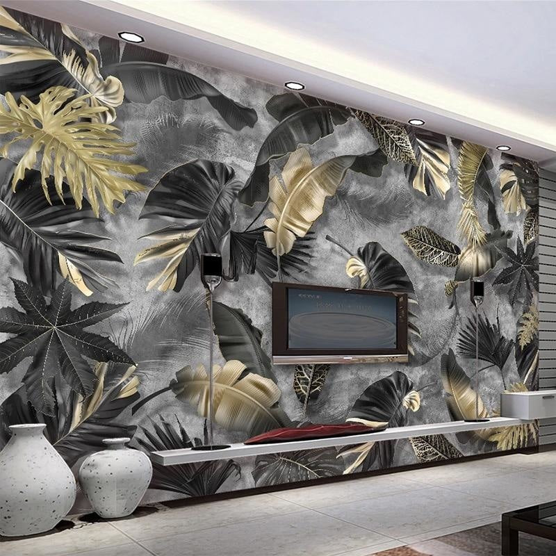Elegant dining room featuring dark tropical leaf wallpaper with metallic gold accents