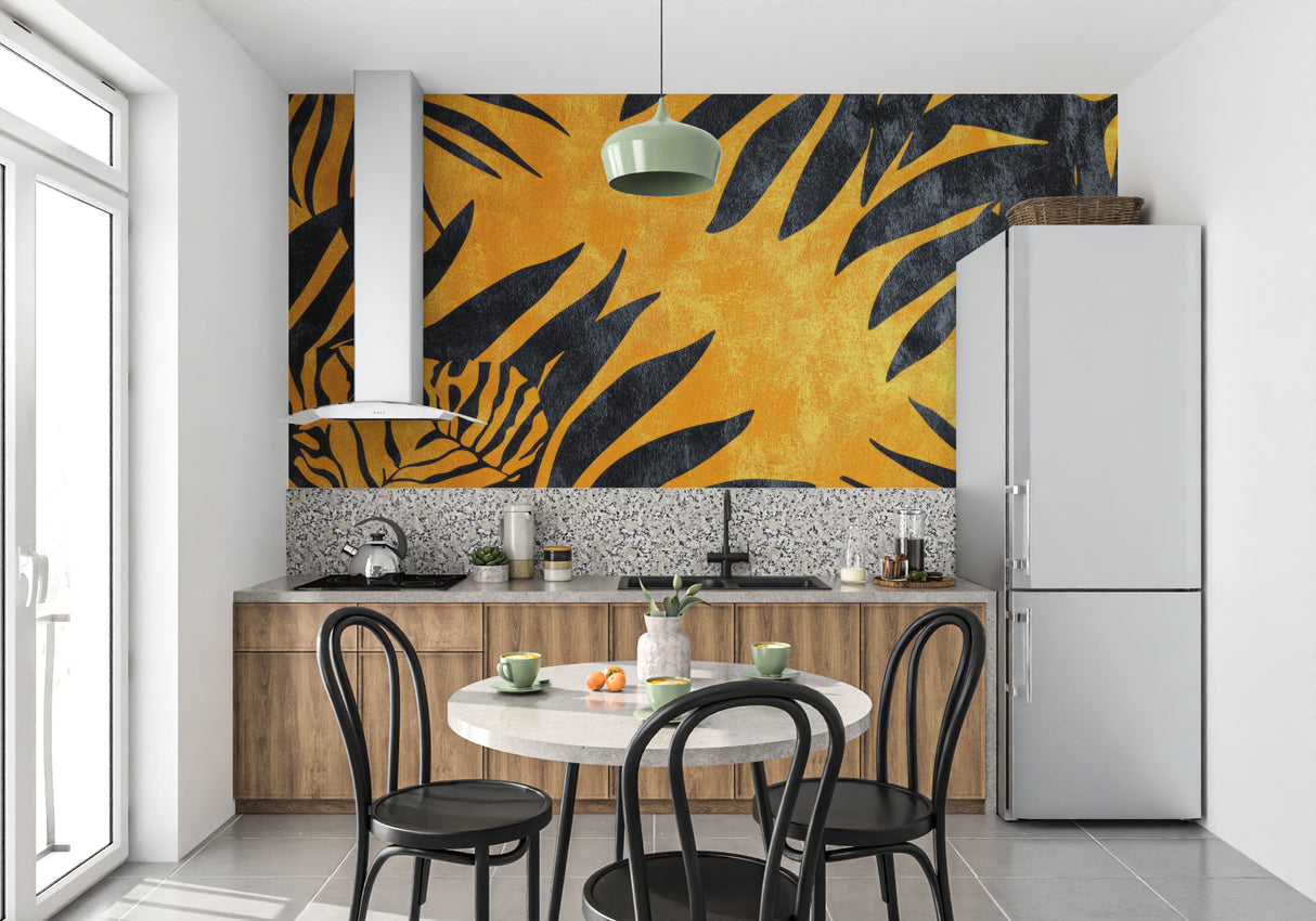 Tropical black and gold leaf wallpaper in modern living room creating luxury atmosphere