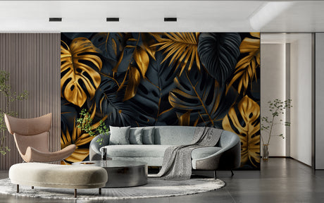Black and gold Monstera leaf wallpaper in modern living room setting with grey sofa