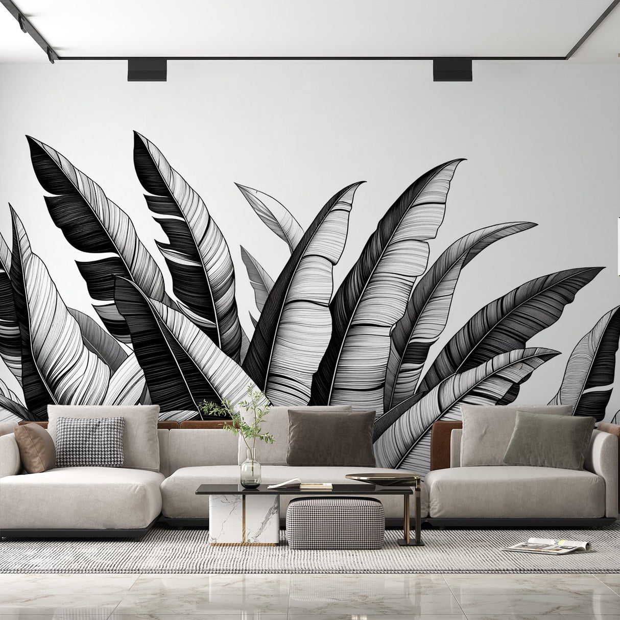 Black and white tropical leaf wallpaper creating a dramatic focal point in a modern living room with minimal furniture