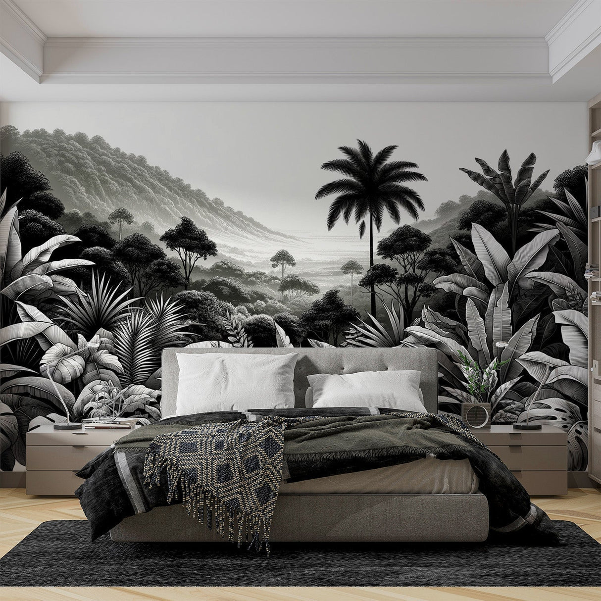 Black and white tropical jungle mural wallpaper creating depth in a modern living room with minimalist furniture