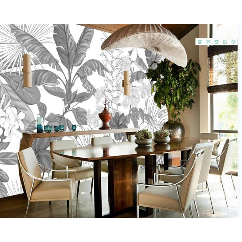 Black and white botanical mural wallpaper in a modern home office setup