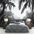 Black and white tropical palm forest wallpaper in modern minimalist living room with natural light