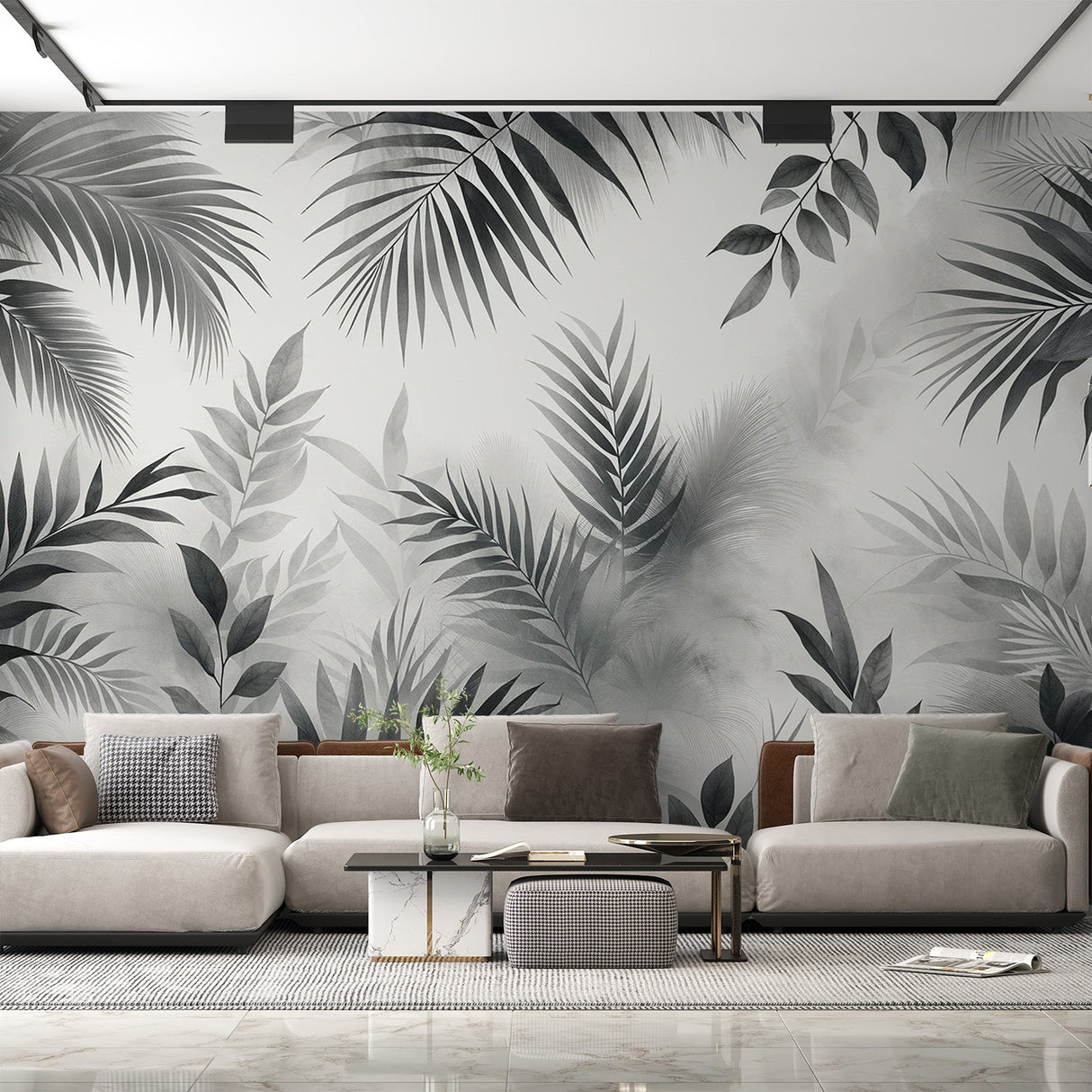 Black and white tropical leaf wallpaper creating a modern statement wall in a bright living room with minimal furniture
