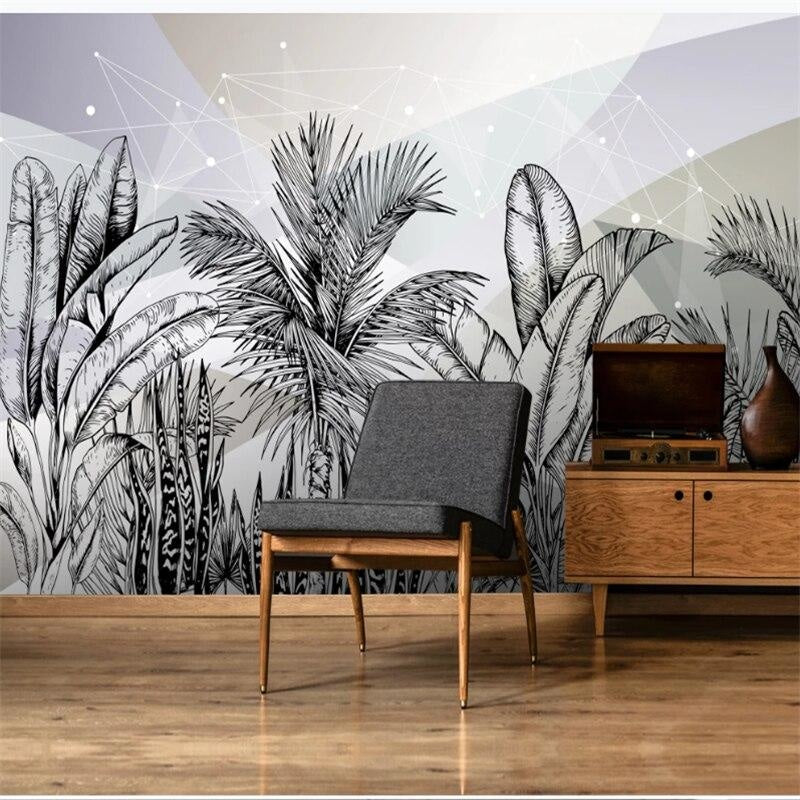 Modern tropical wallpaper installation showcasing palm leaves in a dining area