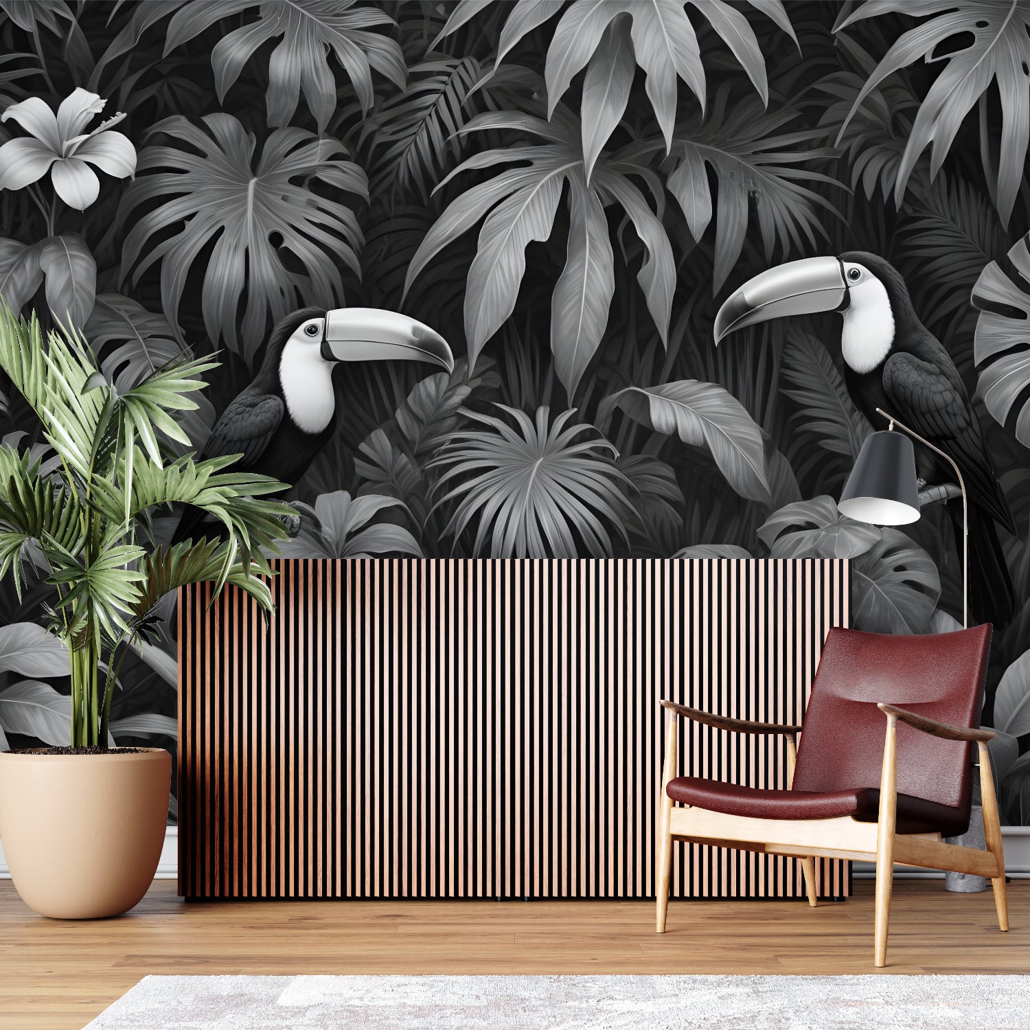 Black and white tropical wallpaper adding depth to an entrance hall