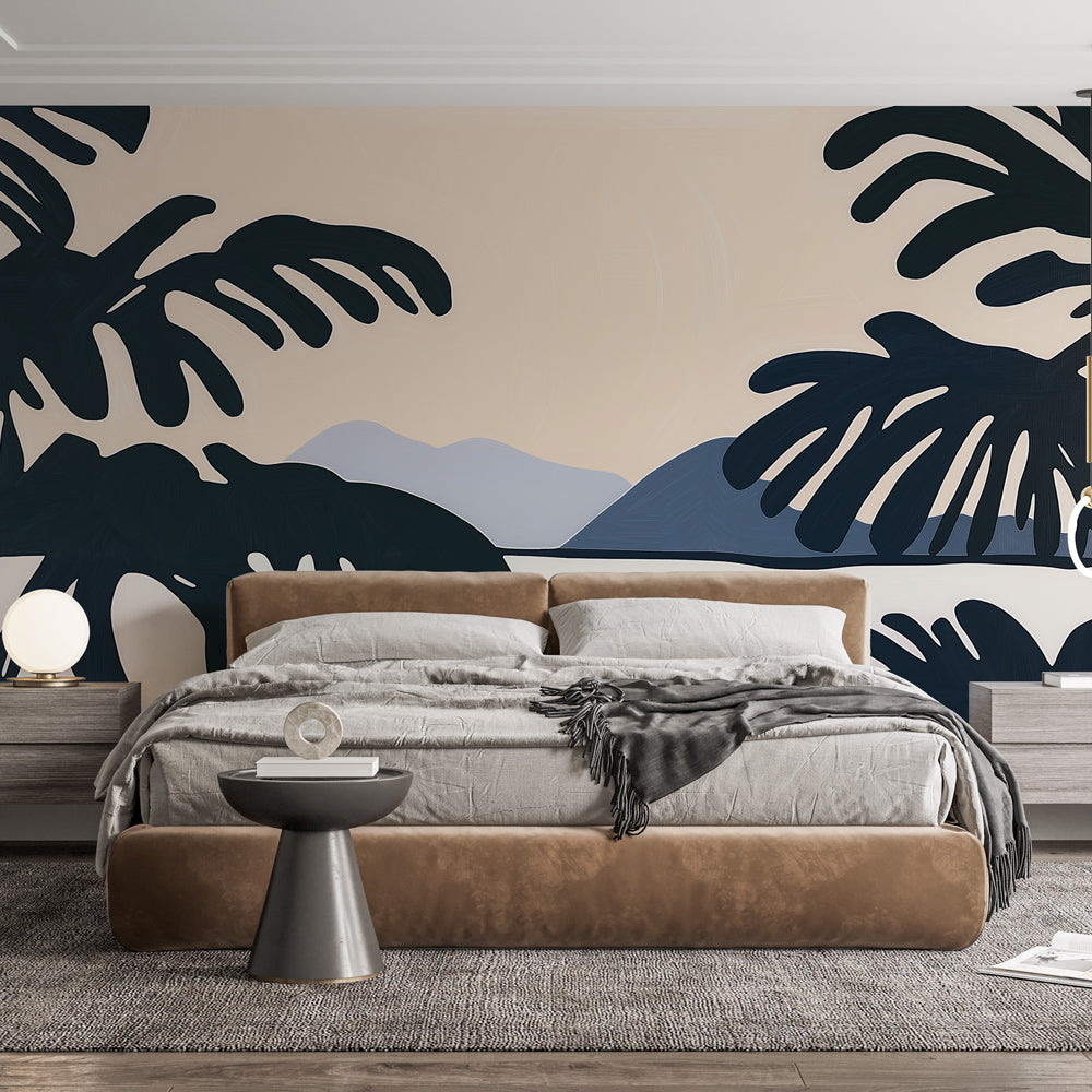 Tropical Monstera leaf wallpaper creating depth in a modern living room with mountain views and black silhouettes