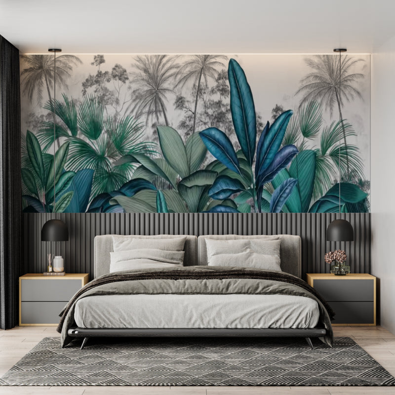 Blue-green palm leaf mural in a cozy bedroom setting with minimal furniture