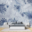 Blue Monstera leaf wallpaper in modern living room creating a fresh tropical atmosphere
