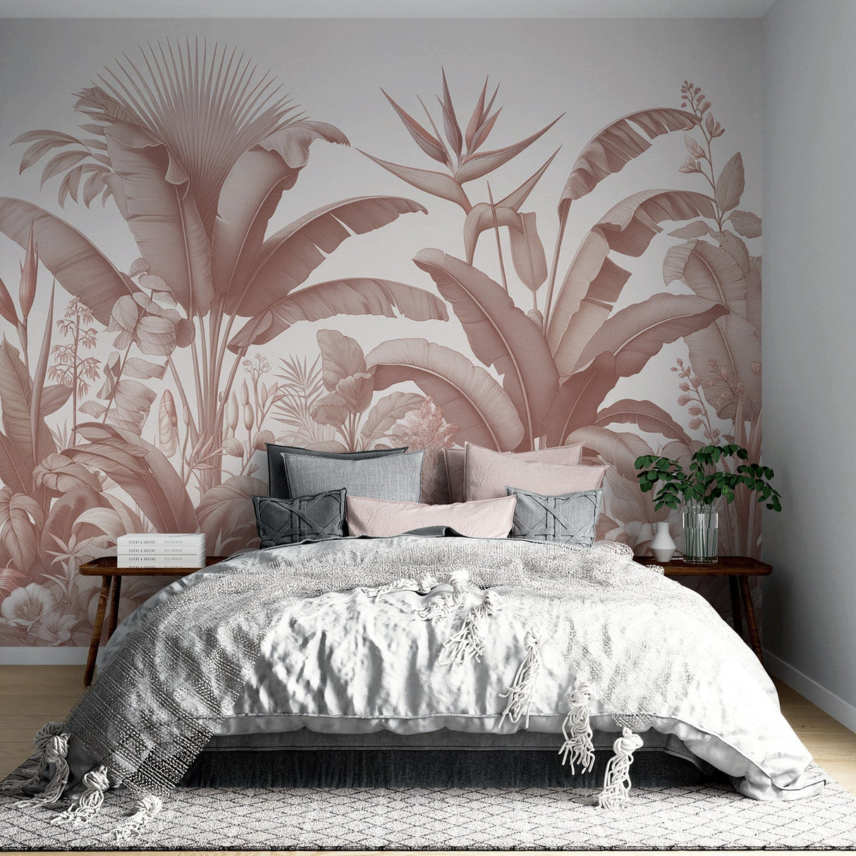 Tropical palm leaf wallpaper in rose gold creating an elegant backdrop in a modern living room with natural light