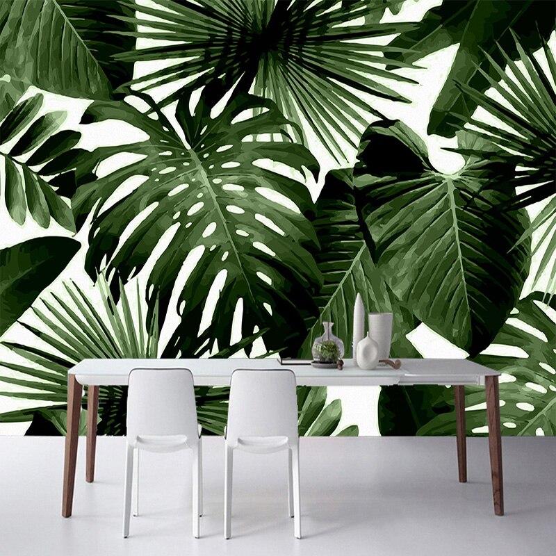 Tropical palm leaf wallpaper bringing fresh feel to dining room space