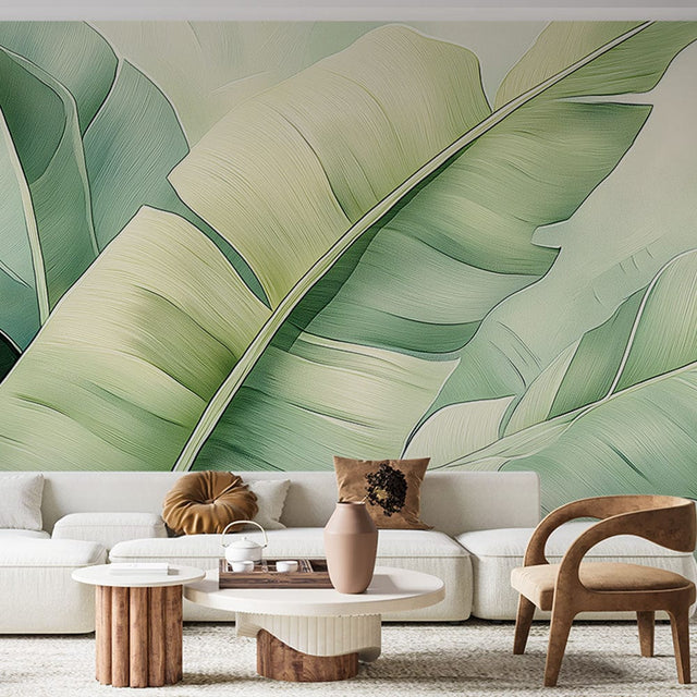 Tropical leaf wallpaper creating a peaceful atmosphere in a modern living room with natural light and minimal furniture