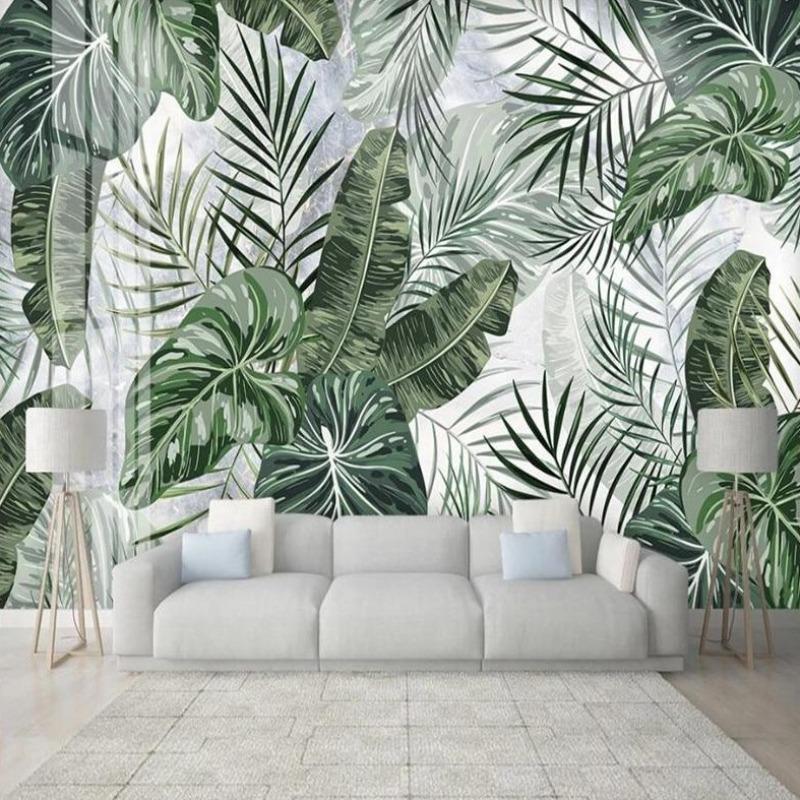 Tropical leaf wallpaper creating a fresh modern look in a bright living room with natural light