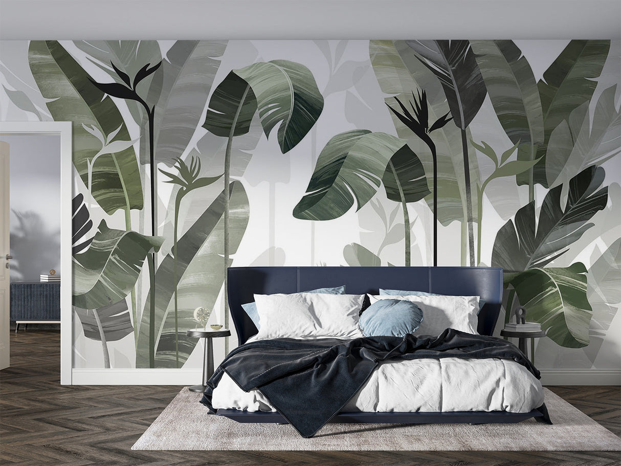 Tropical leaf wallpaper creating a fresh garden feel in a modern living room with white furniture