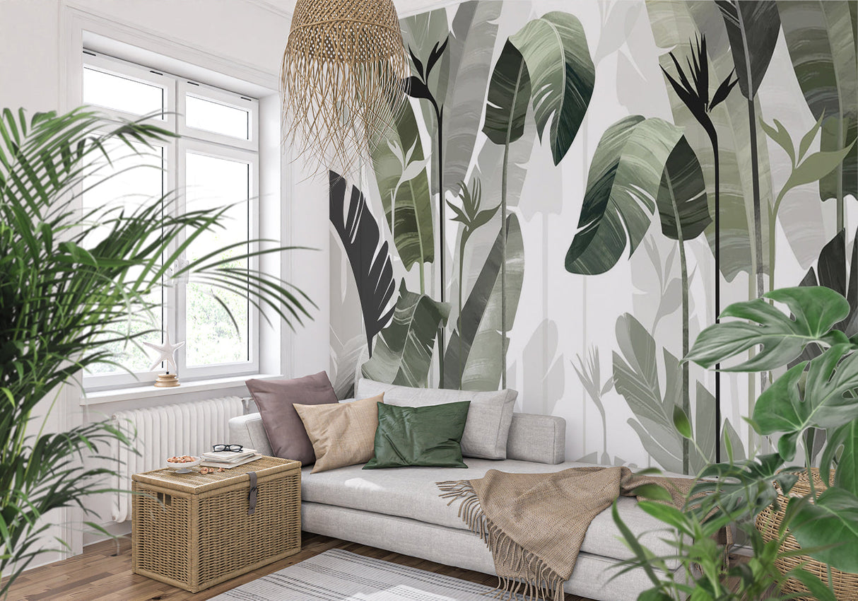 Monstera leaf mural bringing nature into a cozy bedroom setting