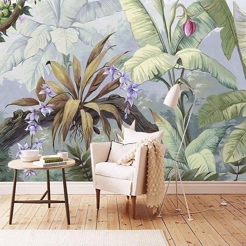 Botanical wall mural with banana leaves and orchids adding natural charm to a bedroom setting
