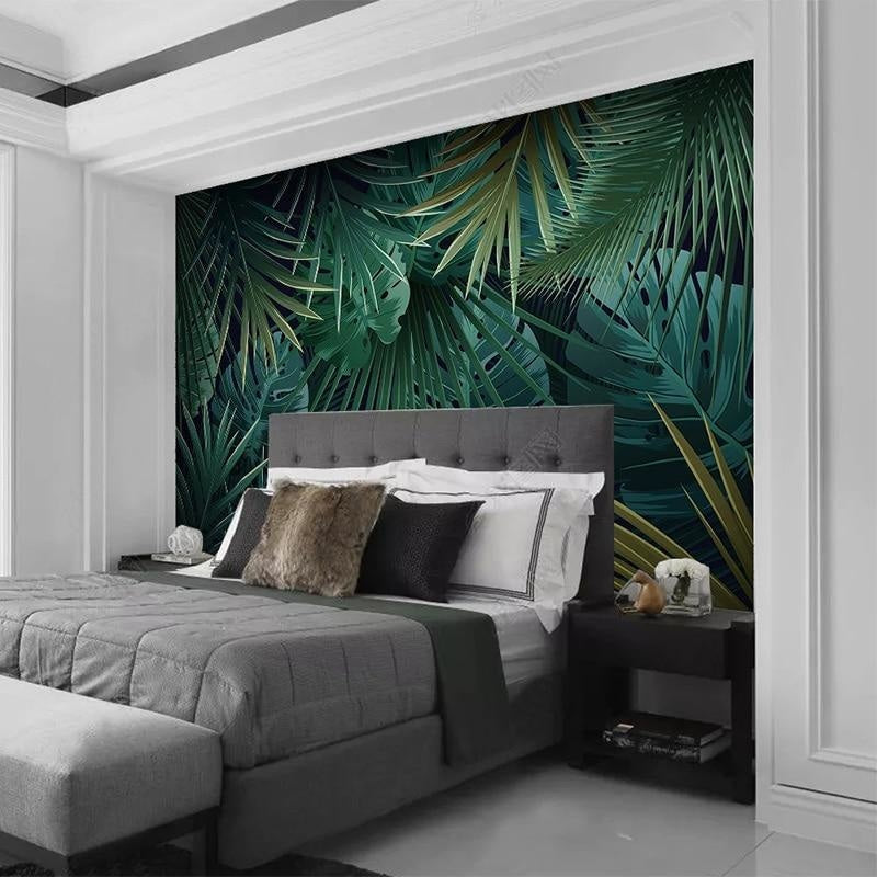 Tropical leaf wallpaper creating a fresh atmosphere in modern living room with white sofa and natural light