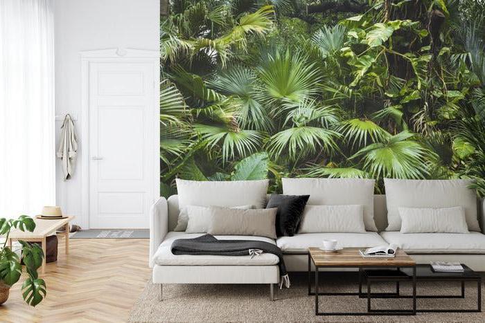 Botanical wall mural with palm leaves creating depth in master bedroom