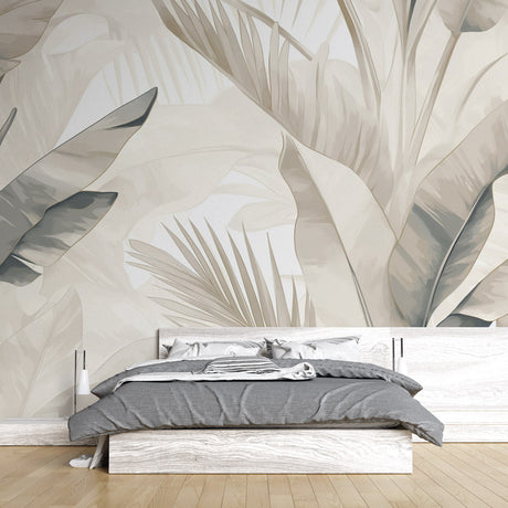 Minimalist tropical palm leaf wallpaper creating a calm atmosphere in a modern living room with beige furniture