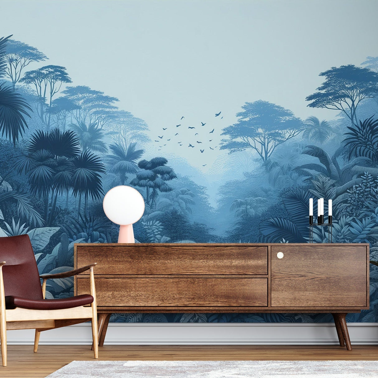 Blue tropical jungle wallpaper creating a serene atmosphere in a modern living room with natural light