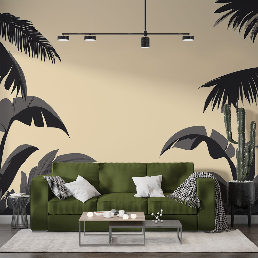Modern black palm silhouette wallpaper in a bright living room, showing tropical pattern against beige walls