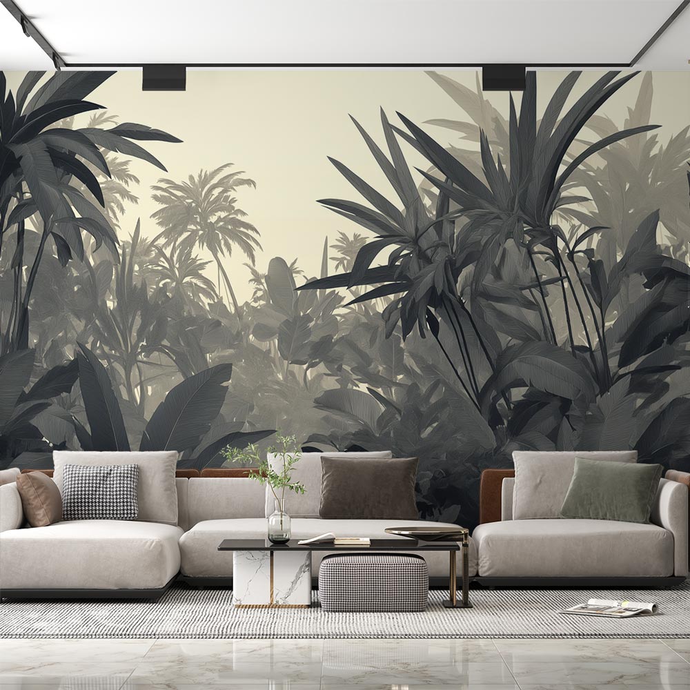 Tropical jungle wallpaper in monochrome creating depth in a modern living room with minimal furniture