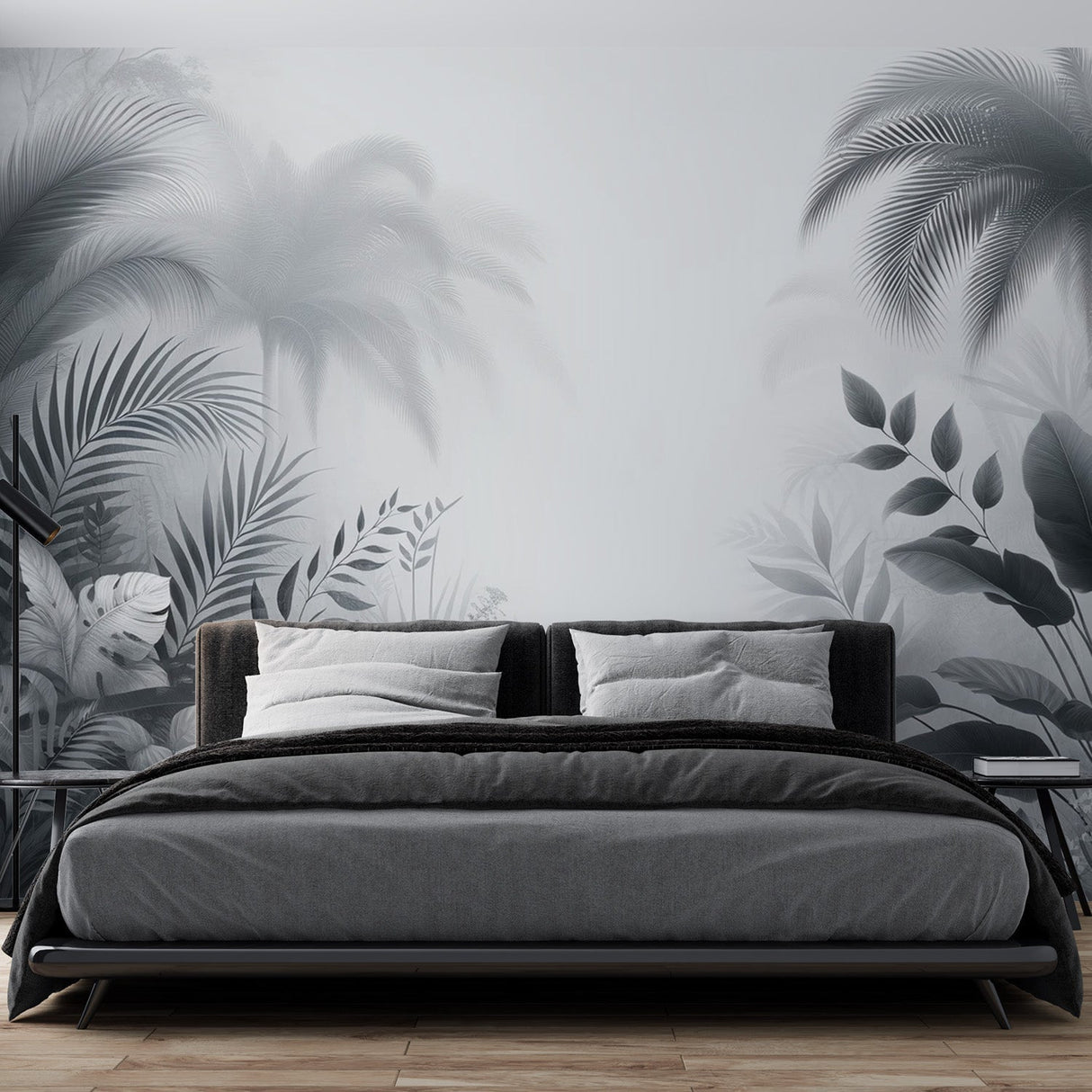 Monochrome tropical palm wallpaper creating depth in a modern living room with gray sofa and natural light