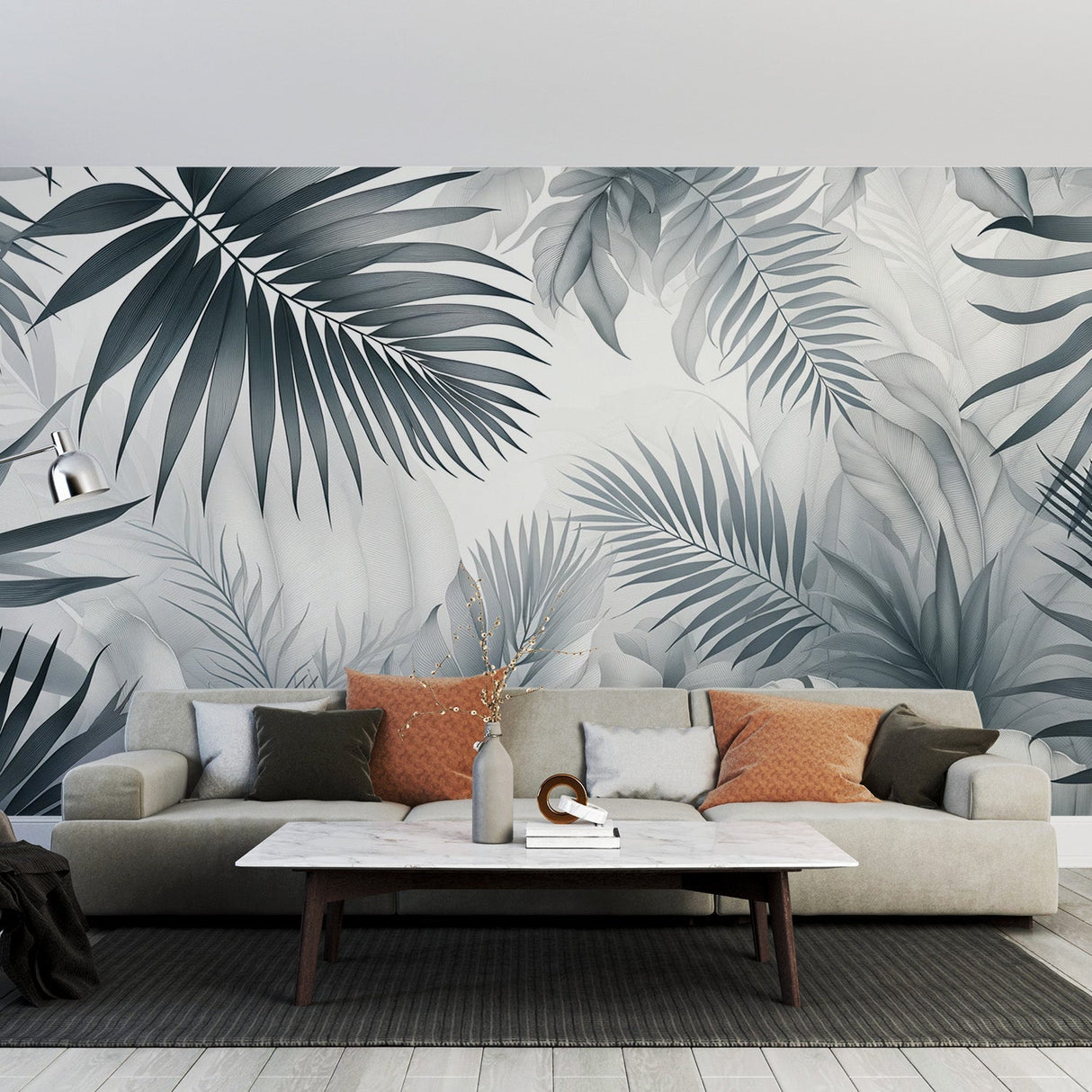 Modern tropical palm leaf wallpaper creating a striking focal point in a minimalist living room with natural light