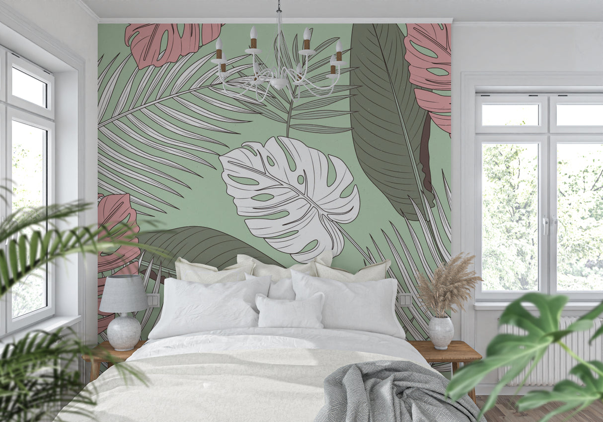 Tropical Monstera leaf wallpaper in modern living room with pink sofa and natural light