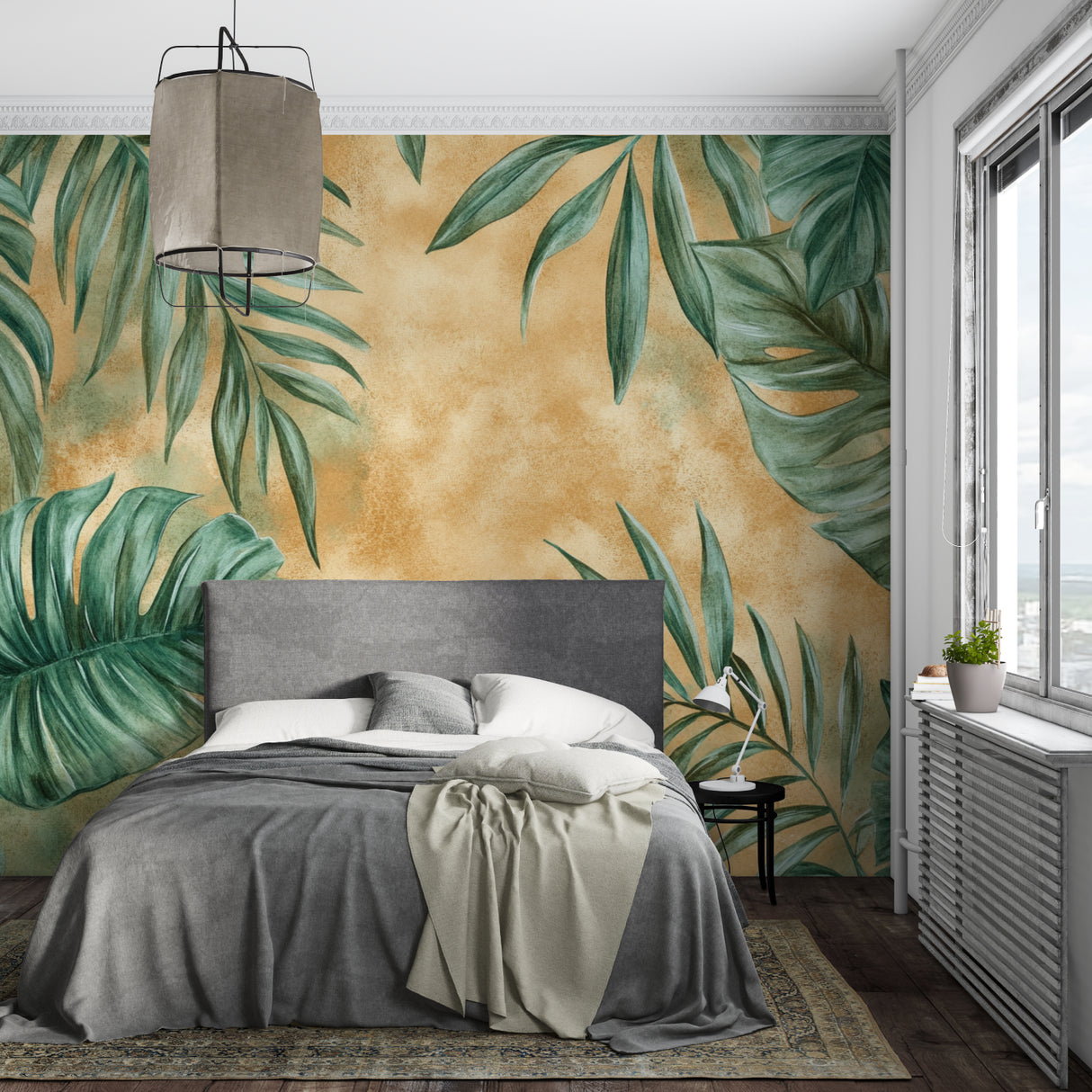 Monstera wall mural bringing life to a cozy bedroom with terracotta accents