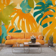 Tropical leaf wallpaper bringing fresh energy to modern living room with orange and teal monstera leaves