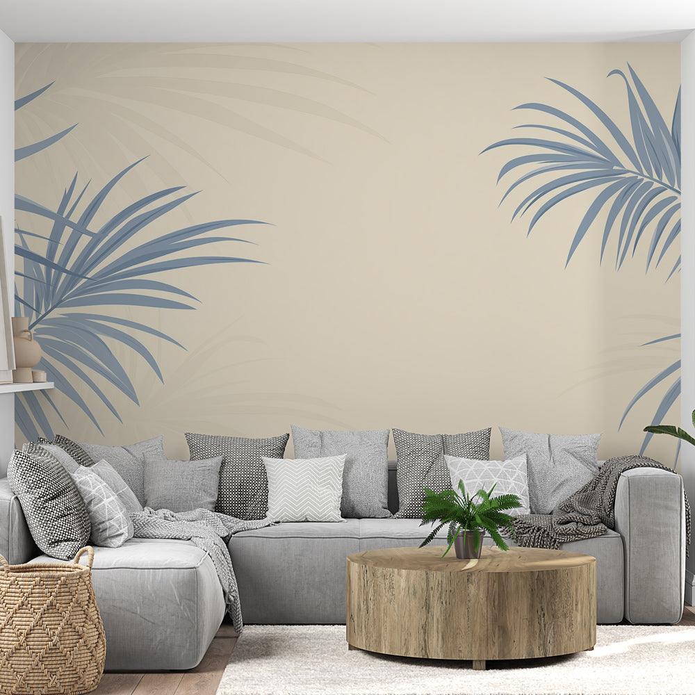 Tropical palm leaf wallpaper creating a serene atmosphere in a modern living room with blue and beige tones