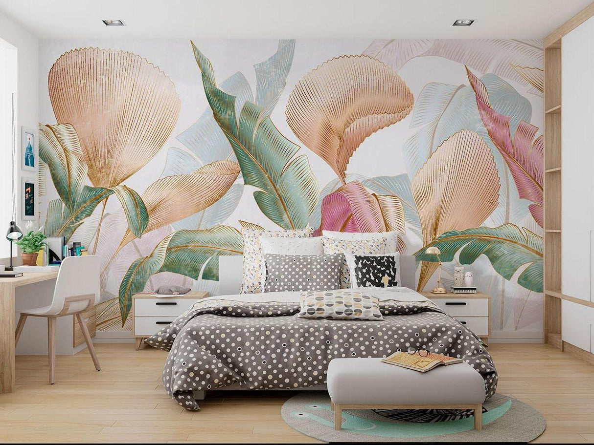 Pastel palm leaf mural with golden details bringing luxury to a master bedroom