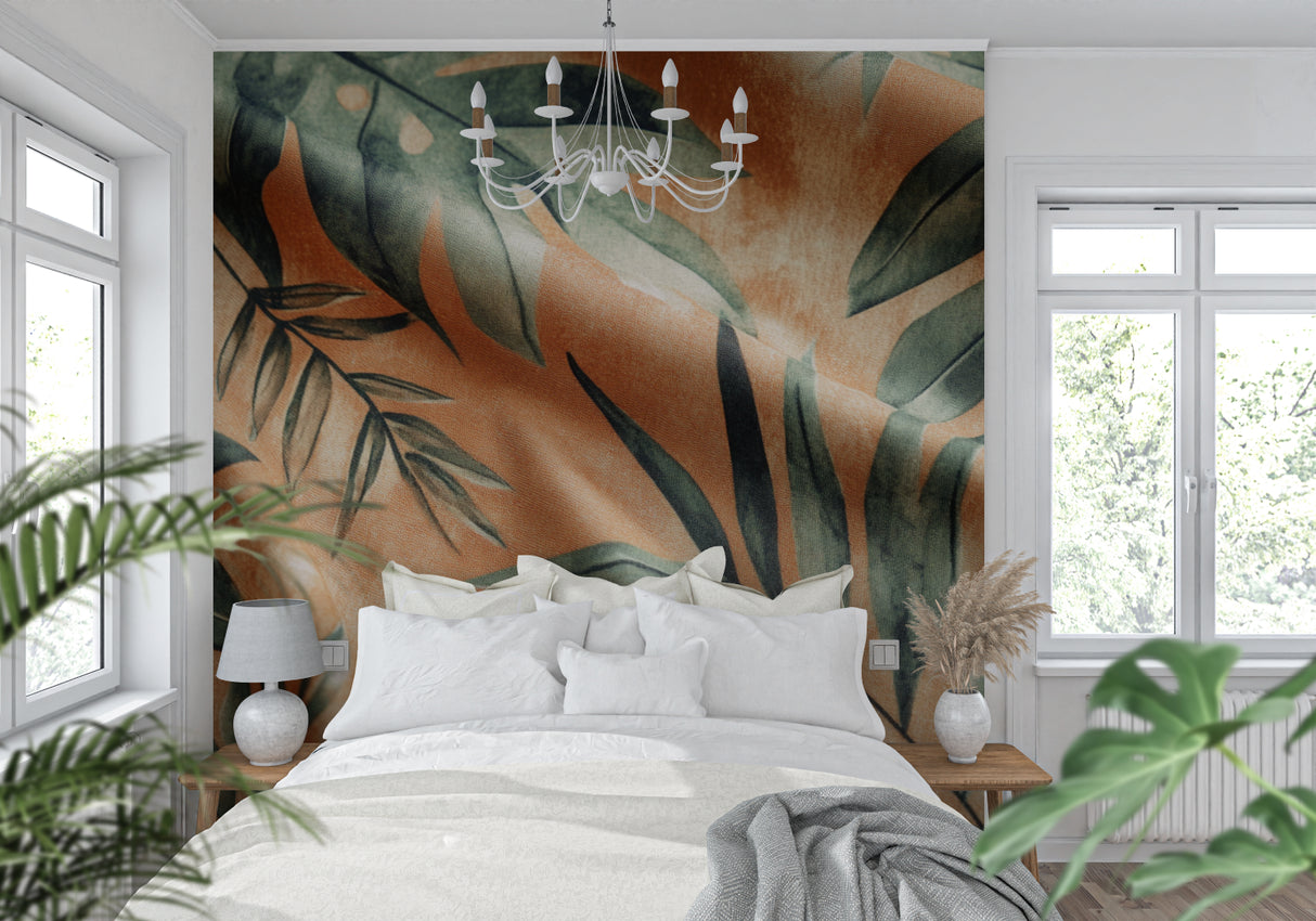 Dining room with tropical leaf mural wallpaper featuring warm terracotta tones