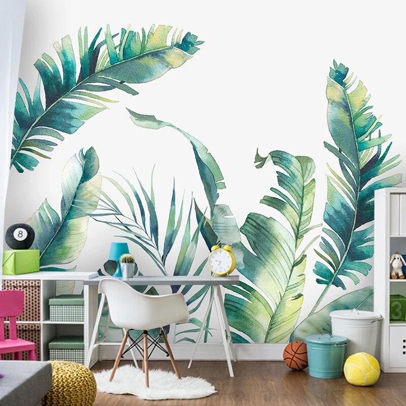 Banana leaf wallpaper mural in master bedroom with natural light highlighting watercolor details