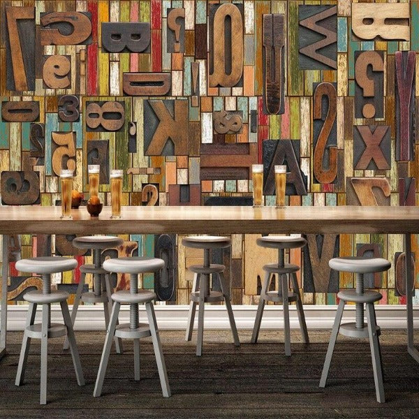 Vintage typography wallpaper creating a cozy atmosphere in a creative studio space