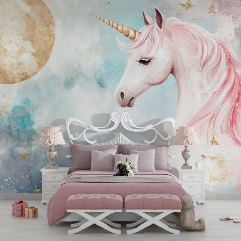 Pink and gold unicorn wallpaper creating magic in a modern children's bedroom with soft lighting