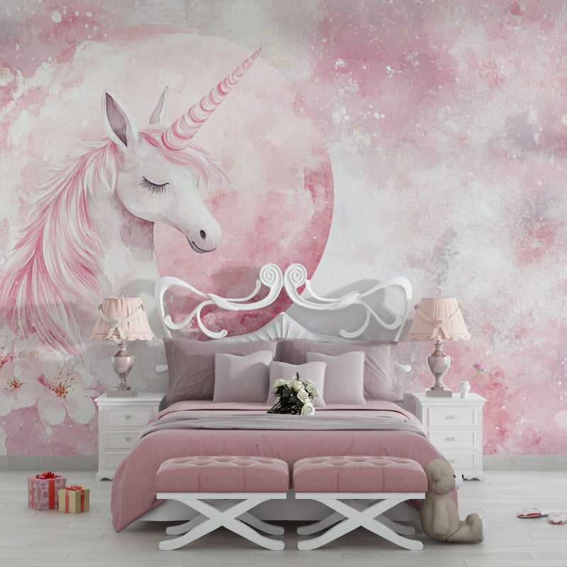 Dreamy unicorn wallpaper in a playroom with pink and white decor