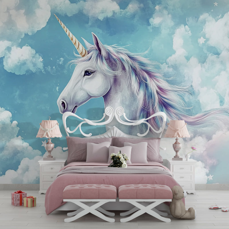 Unicorn wall mural bringing magic to a cozy children's bedroom with soft lighting