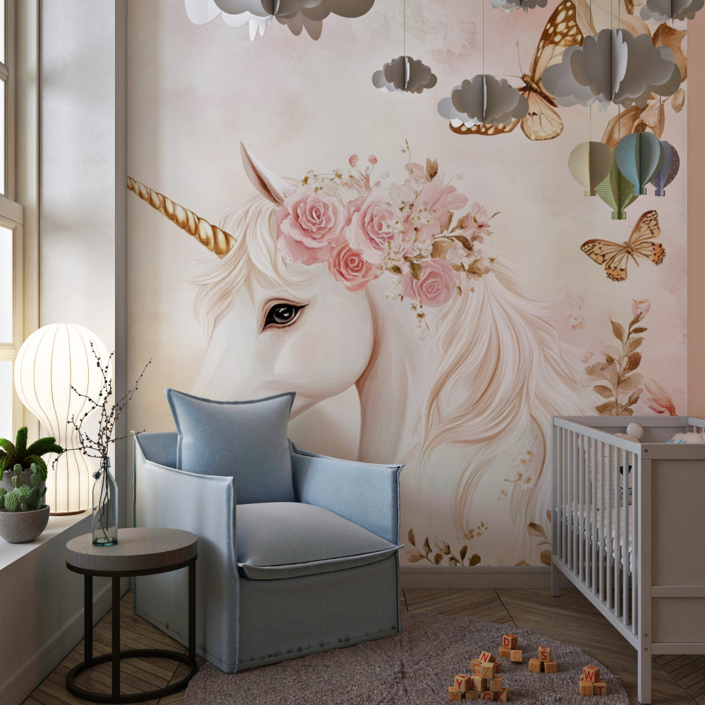 Unicorn wallpaper mural in a cozy nursery with pink accents and white furniture