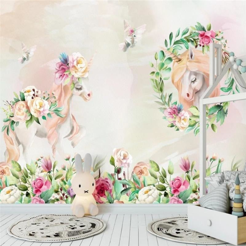 Unicorn garden wallpaper in a bright girl's bedroom, showing pink roses and magical unicorns dancing across the wall