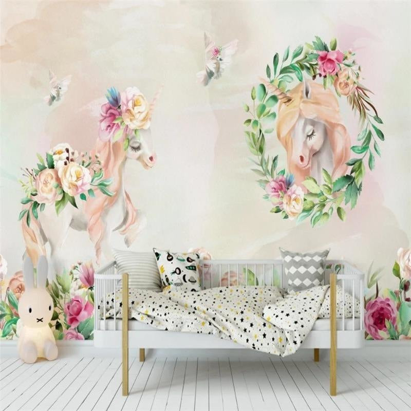 Magical unicorn wallpaper creating an enchanted atmosphere in a nursery with soft pink and floral details