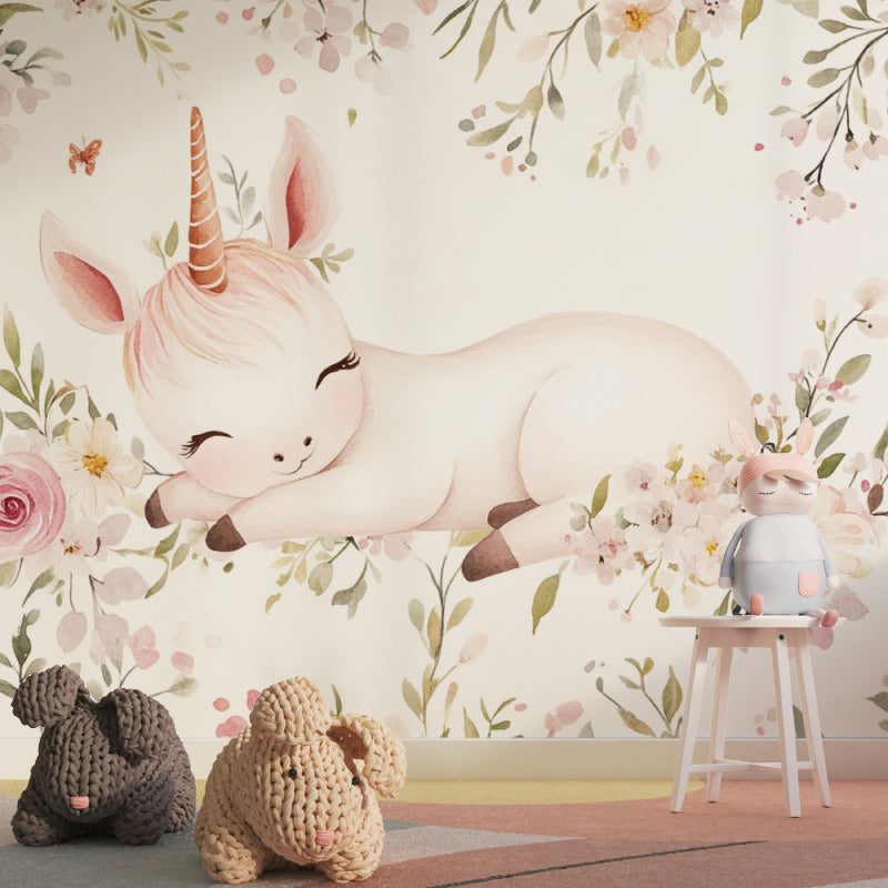 Pink unicorn wall mural displayed in girl's bedroom with white furniture