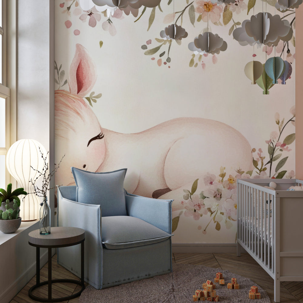Floral unicorn wallpaper creating dreamy atmosphere in baby room