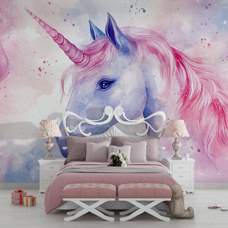 Reading nook decorated with fantasy unicorn mural wallpaper in soft pastels