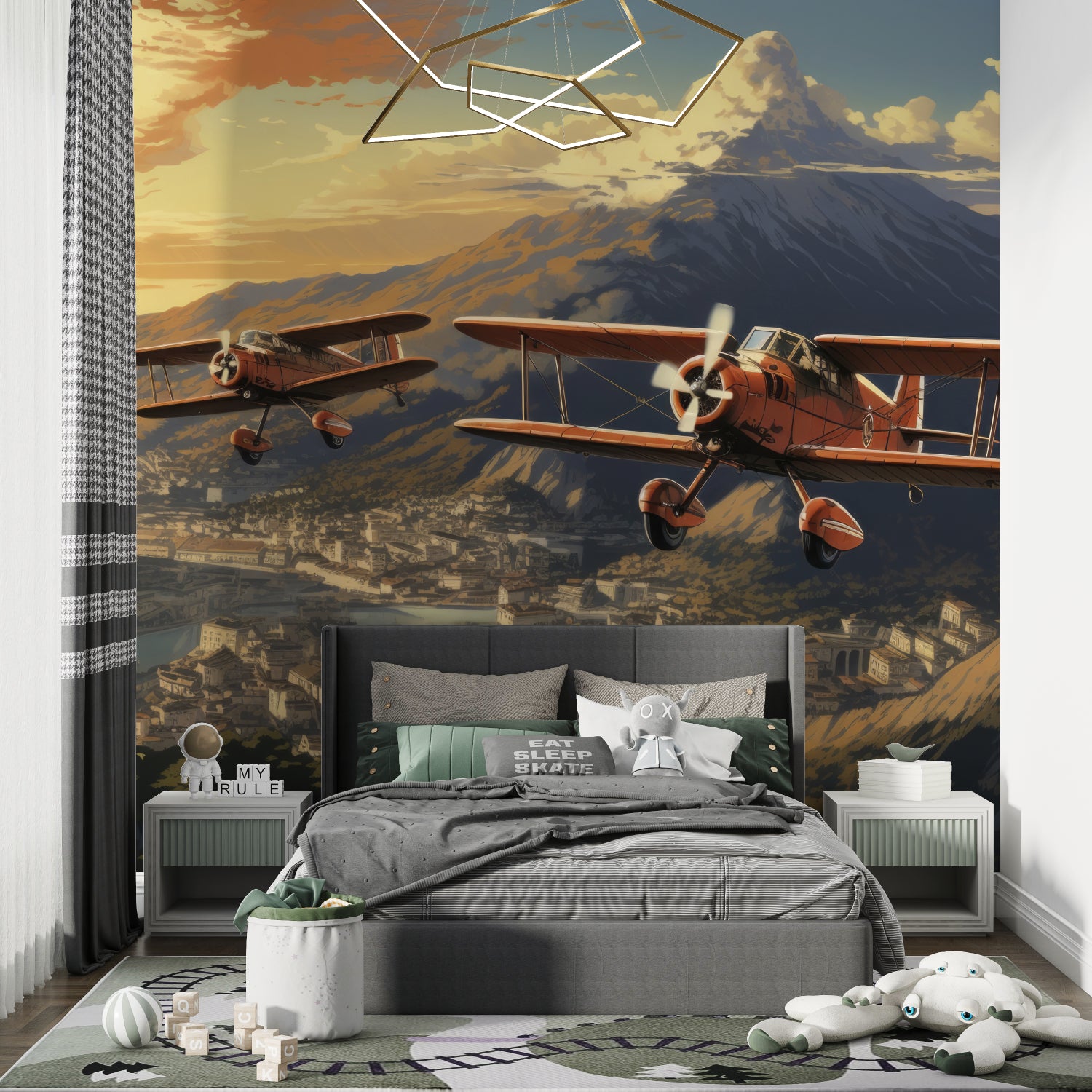 Home office featuring vintage airplane wallpaper with golden hour mountain scene